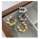 ARETES GIROS CIRCULARES PARA MUJER OUTFIT