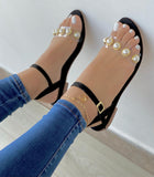 SANDALIA PLANA DE PEPAS